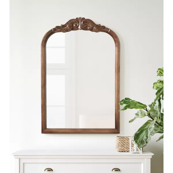 Kate and Laurel Arendahl Traditional Arch Wall Mirror 24 x 36 Natural Wood Vintage BaroqueInspired Wooden Arched Bathroom Mirror for Over Sink with Ornate Carved CrownWalnut Brown