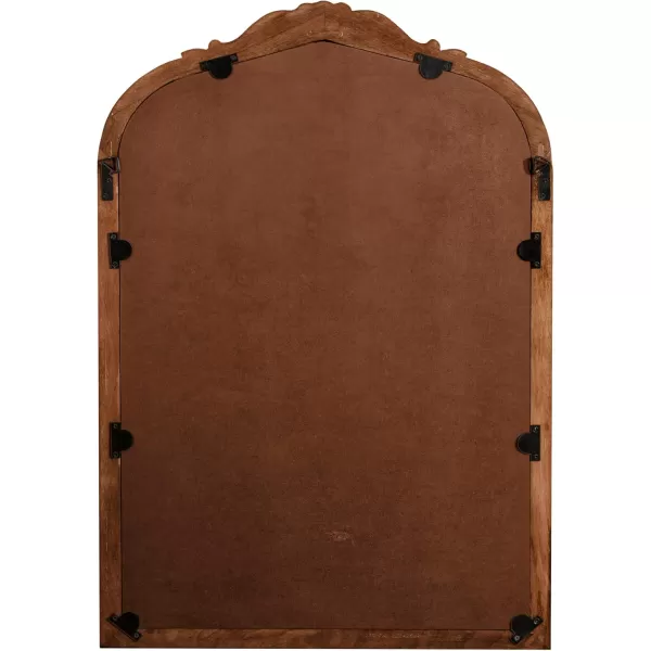 Kate and Laurel Arendahl Traditional Arch Wall Mirror 24 x 36 Natural Wood Vintage BaroqueInspired Wooden Arched Bathroom Mirror for Over Sink with Ornate Carved CrownWalnut Brown