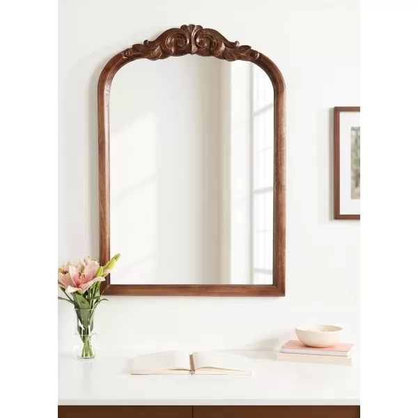 Kate and Laurel Arendahl Traditional Arch Wall Mirror 24 x 36 Natural Wood Vintage BaroqueInspired Wooden Arched Bathroom Mirror for Over Sink with Ornate Carved CrownWalnut Brown