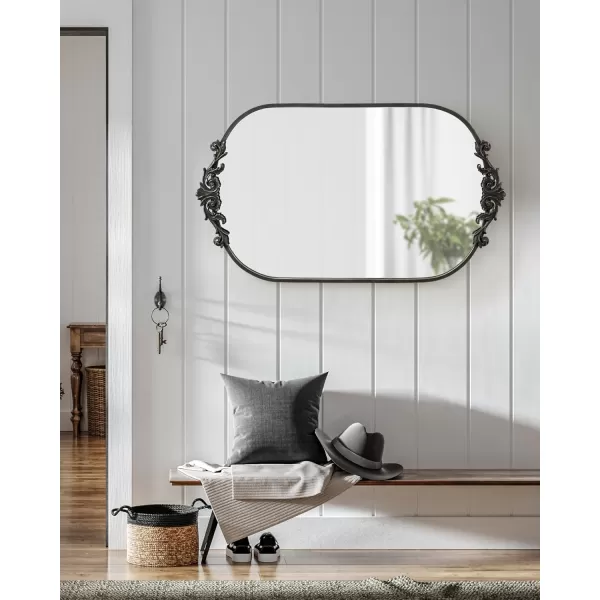 Kate and Laurel Arendahl Traditional Capsule Wall Mirror 24 x 41 Black Vintage Glam BaroqueInspired Round Bathroom Vanity Mirror with Ornate CrownBlack