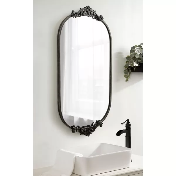 Kate and Laurel Arendahl Traditional Capsule Wall Mirror 24 x 41 Black Vintage Glam BaroqueInspired Round Bathroom Vanity Mirror with Ornate CrownBlack