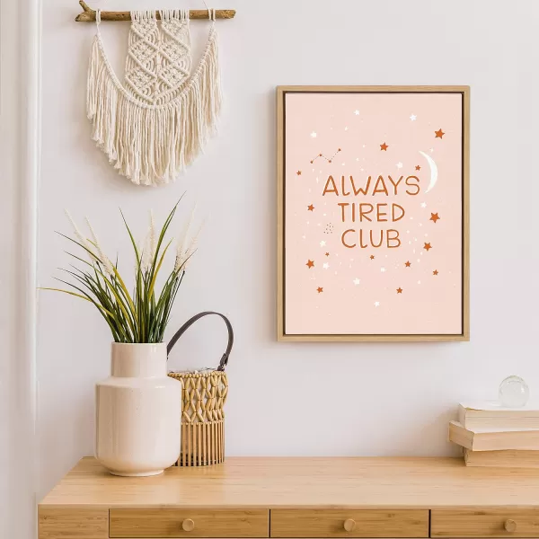 Kate and Laurel Sylvie Always Tired Club Framed Canvas Wall Art by DuchessPlum 18x24 Natural Humorous Art for Wall