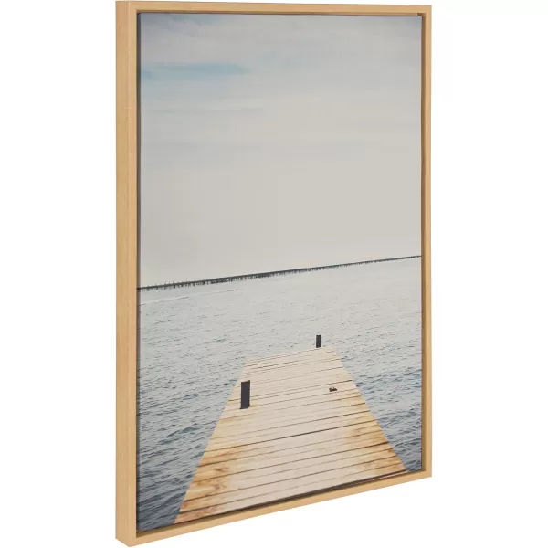 Kate and Laurel Sylvie Standing On Dock Framed Canvas Wall Art by Laura Evans 23x33 Natural Beautiful Coastal Wall Decor