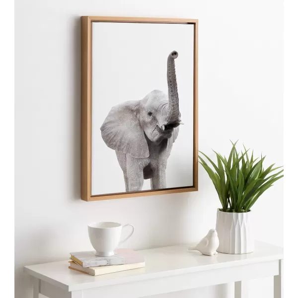 Kate and Laurel Sylvie Elephant with Raised Trunk Animal Print Portrait Framed Canvas Wall Art by Amy Peterson 23x33 GrayNatural