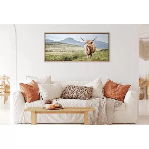 Kate and Laurel Sylvie Highland Cow Mountain Landscape Framed Canvas Wall Art by The Creative Bunch Studio 18x40 Natural Decorative Farmhouse Decor for WallNatural