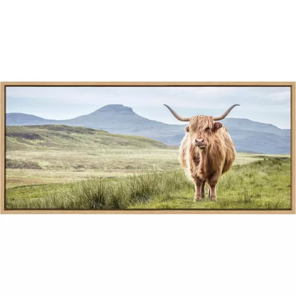 Kate and Laurel Sylvie Highland Cow Mountain Landscape Framed Canvas Wall Art by The Creative Bunch Studio 18x40 Natural Decorative Farmhouse Decor for WallNatural