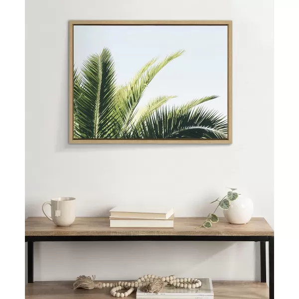 Kate and Laurel Sylvie Tropical Palm Under Blue Sky Framed Canvas Wall Art by Amy Peterson Art Studio 18x24 Natural Decorative Coastal Art for WallNatural
