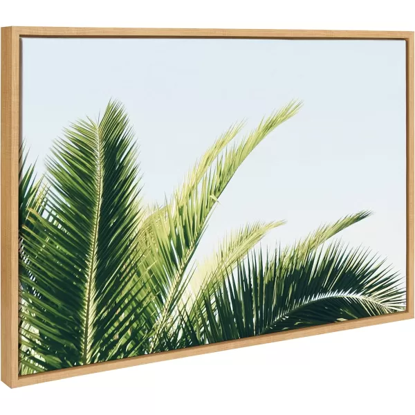 Kate and Laurel Sylvie Tropical Palm Under Blue Sky Framed Canvas Wall Art by Amy Peterson Art Studio 18x24 Natural Decorative Coastal Art for WallNatural