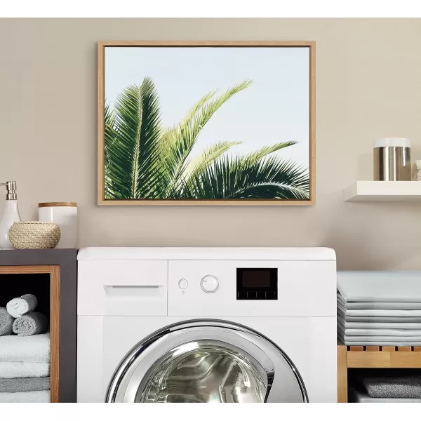 Kate and Laurel Sylvie Tropical Palm Under Blue Sky Framed Canvas Wall Art by Amy Peterson Art Studio 18x24 Natural Decorative Coastal Art for WallNatural
