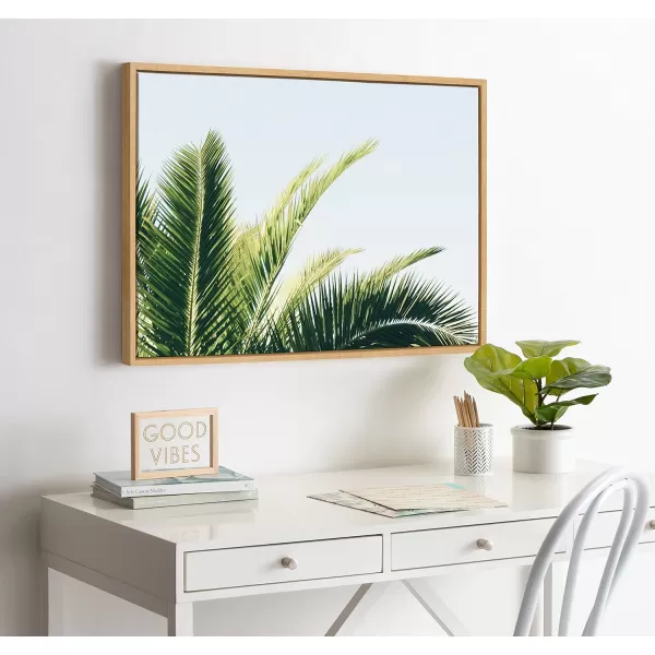 Kate and Laurel Sylvie Tropical Palm Under Blue Sky Framed Canvas Wall Art by Amy Peterson Art Studio 18x24 Natural Decorative Coastal Art for WallNatural