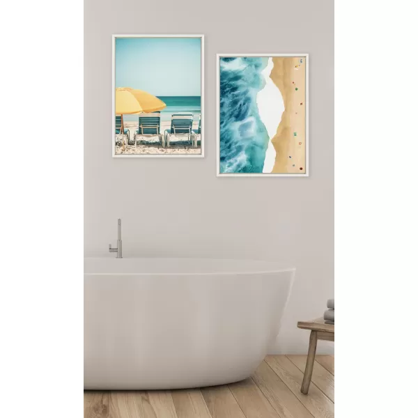 Kate and Laurel Sylvie Yellow Umbrella 2 Framed Canvas Wall Art by Alicia Bock 28x38 White Coastal Beach Chairs Photography Art for WallWhite