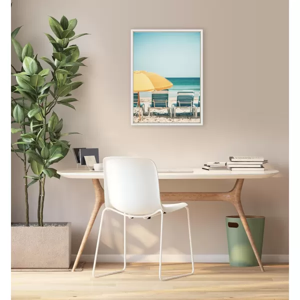 Kate and Laurel Sylvie Yellow Umbrella 2 Framed Canvas Wall Art by Alicia Bock 28x38 White Coastal Beach Chairs Photography Art for WallWhite