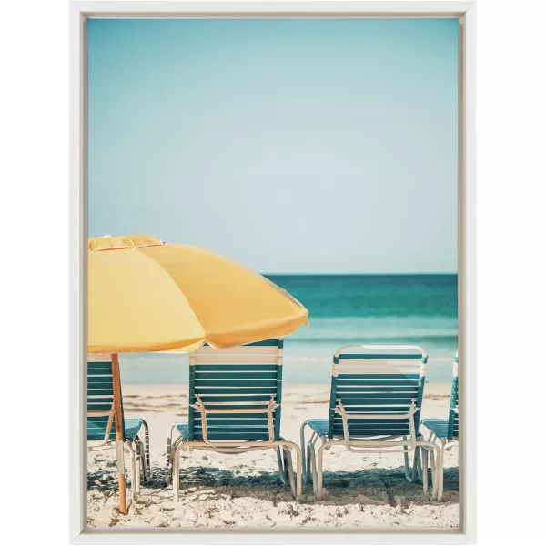 Kate and Laurel Sylvie Yellow Umbrella 2 Framed Canvas Wall Art by Alicia Bock 28x38 White Coastal Beach Chairs Photography Art for WallWhite