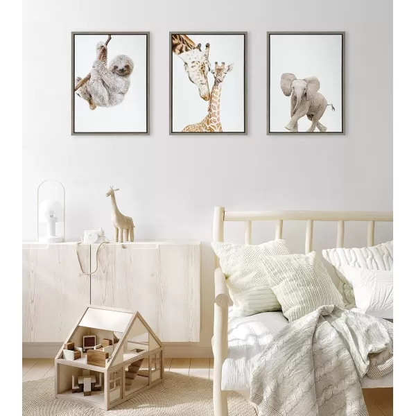 Kate and Laurel Sylvie Baby Elephant Walk Framed Canvas Wall Art by Amy Peterson Art Studio 18x24 Natural Modern Animal Portrait Art for WallGray