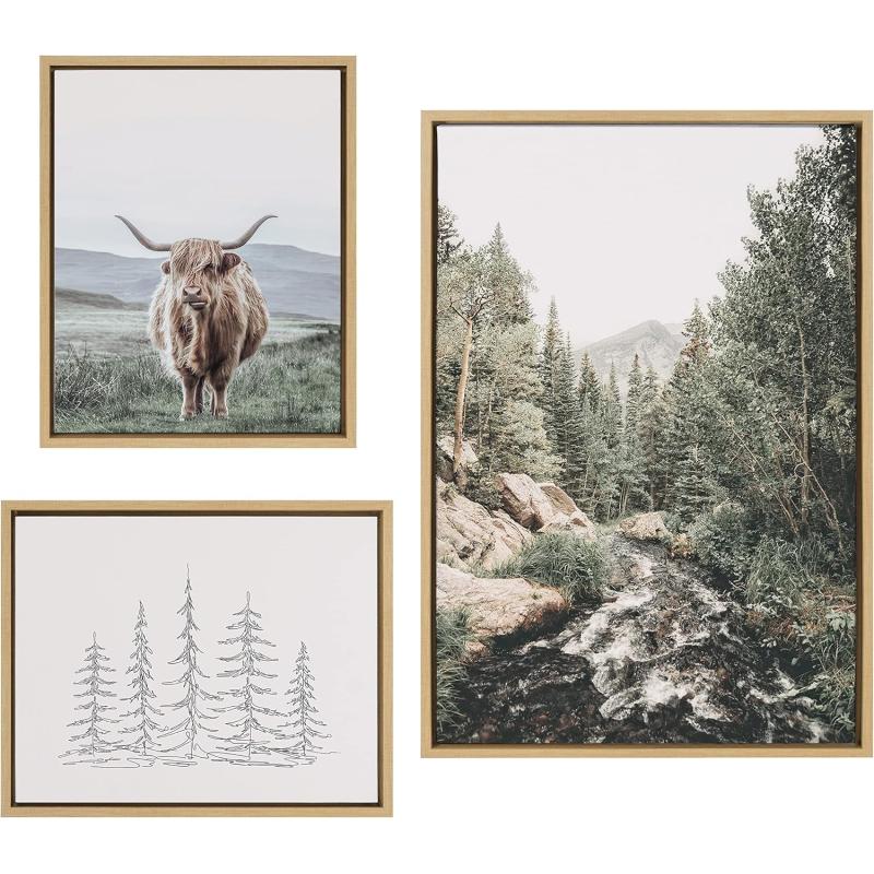 Kate and Laurel Sylvie Meet Me Here Highland Cow Mountain Landscape and Minimalist Evergreen Trees Framed Canvas Wall Art Set by Various Artists Set of 3 two 16x20 and one 23x33 Natural FramesNatural