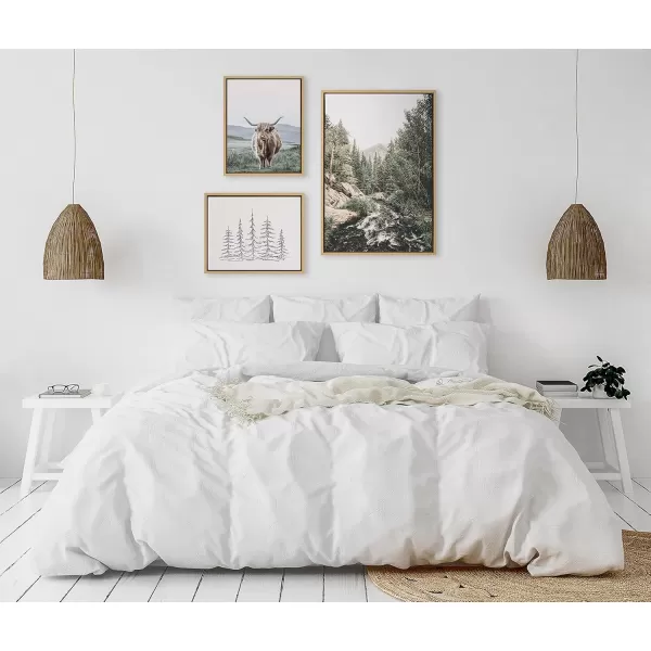 Kate and Laurel Sylvie Meet Me Here Highland Cow Mountain Landscape and Minimalist Evergreen Trees Framed Canvas Wall Art Set by Various Artists Set of 3 two 16x20 and one 23x33 Natural FramesNatural