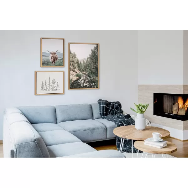 Kate and Laurel Sylvie Meet Me Here Highland Cow Mountain Landscape and Minimalist Evergreen Trees Framed Canvas Wall Art Set by Various Artists Set of 3 two 16x20 and one 23x33 Natural FramesNatural
