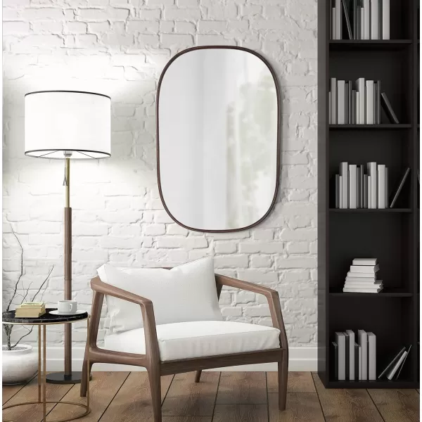 Kate and Laurel Caskill Modern Oval Mirror 18quot x 24quot Black CapsuleShaped Accent Mirror for Entryway Living Room or BathroomBronze