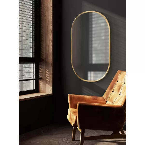 Kate and Laurel Caskill Modern Oval Mirror 18quot x 24quot Black CapsuleShaped Accent Mirror for Entryway Living Room or BathroomGold