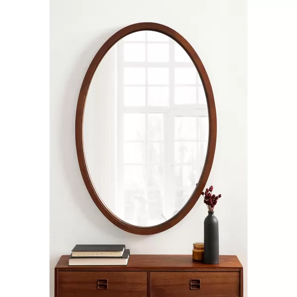 Kate and Laurel Hogan Farmhouse Oval Framed Wall Mirror 18 x 24 Natural Rustic Decorative Traditional Wood Mirror with Soft Curvature and Oval ShapeWalnut Brown