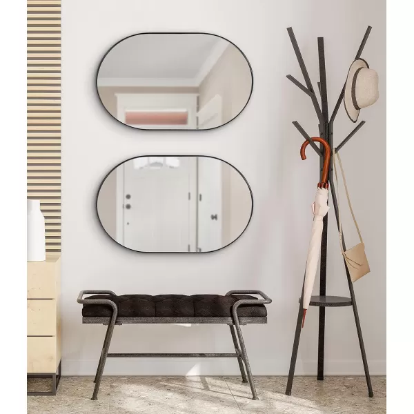 imageKate and Laurel Rollo Midcentury Capsule Wall Mirror 16 x 48 Gold Decorative Full Length Oval Mirror for WallBlack