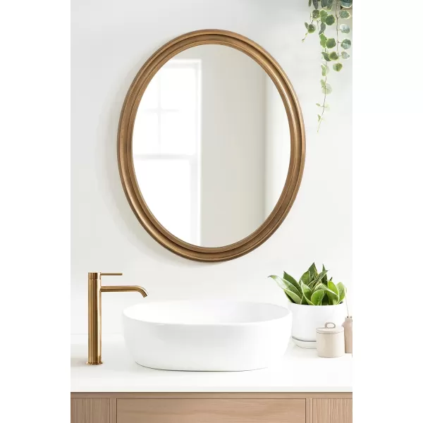imageKate and Laurel Mansell Oval Wall Mirror 24 x 30 Rustic Brown Rustic Farmhouse Wooden Mirror with Modern Oval ShapeGold