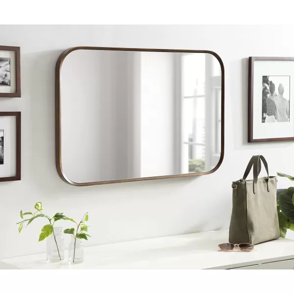 imageKate and Laurel Nordlund Modern Wood Framed Wall Mirror 23 x 35 Walnut Brown Chic Decorative Beechwood Mirror with Rounded Corners for Transitional Wall DecorWalnut Brown