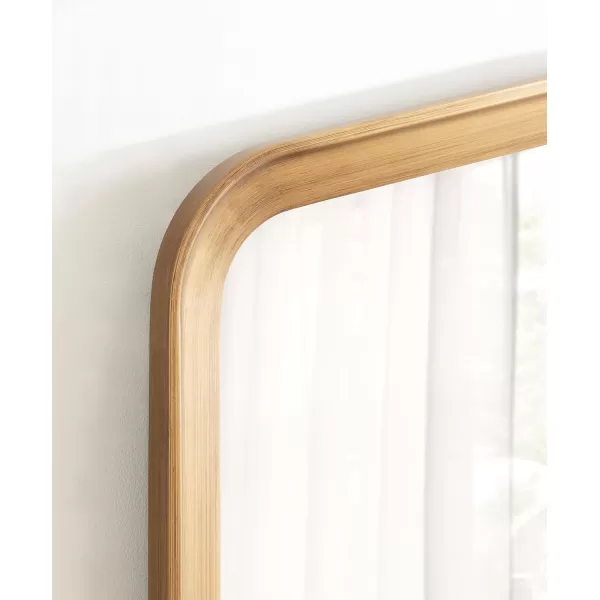 imageKate and Laurel Tudor Traditional Wooden Wide Arch Wall Mirror 36 x 28 Walnut Brown Vintage Arched Hanging Mirror with Pointed Arch and Pieced Wood FrameGold