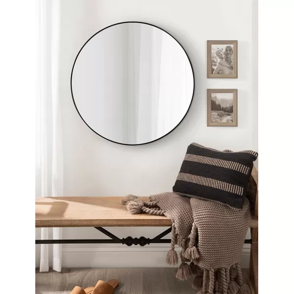 imageKate and Laurel Zayda Round Framed Wall Mirror 34 Inch Diameter Black Metal Minimalist Circular Mirror with Smooth CurvesBlack