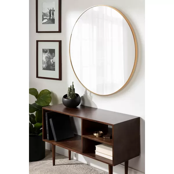 imageKate and Laurel Zayda Round Framed Wall Mirror 34 Inch Diameter Black Metal Minimalist Circular Mirror with Smooth CurvesGold