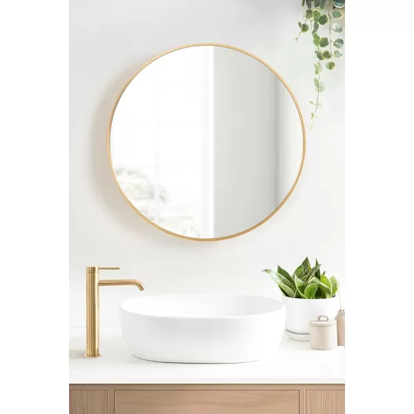 imageKate and Laurel Zayda Round Framed Wall Mirror 34 Inch Diameter Black Metal Minimalist Circular Mirror with Smooth CurvesGold