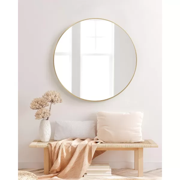 imageKate and Laurel Zayda Round Framed Wall Mirror 34 Inch Diameter Black Metal Minimalist Circular Mirror with Smooth CurvesGold