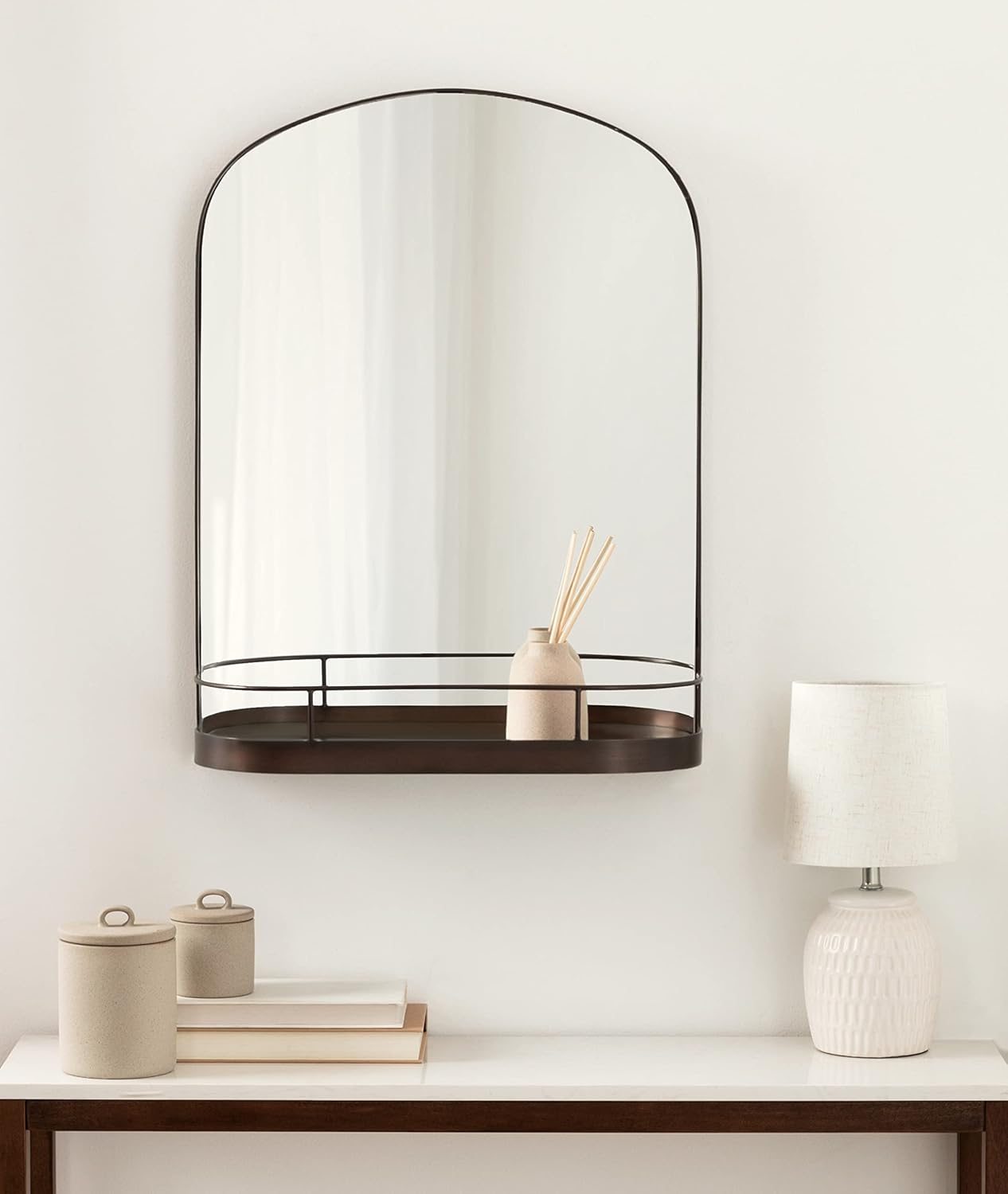 imageKate and Laurel Peyson Arched Wall Mirror with Shelf 18 x 24 Silver Decorative Modern Metal Arch Mirror with Storage Shelf for Glamorous Wall DcorBronze