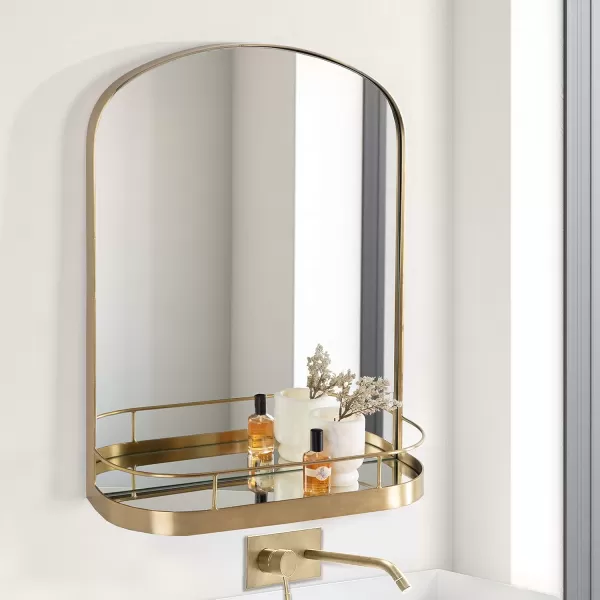 imageKate and Laurel Peyson Arched Wall Mirror with Shelf 18 x 24 Gold Decorative Modern Metal Arch Mirror with Storage Shelf for Glamorous Wall Decor