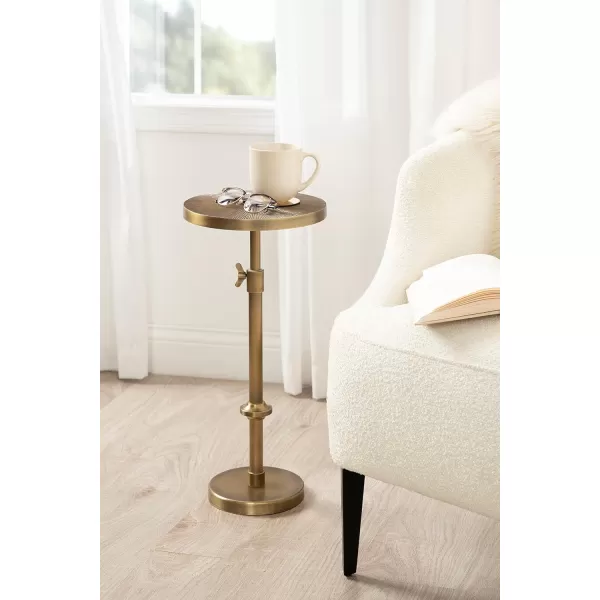 imageKate and Laurel Engles Traditional AdjustableHeight Pedestal Drink Table 10 x 10 x 30 Antique Brass Vintage Round Indoor Metal Plant Stand with Embossed Sunburst PatternGold