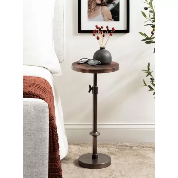 imageKate and Laurel Engles Traditional AdjustableHeight Pedestal Drink Table 10 x 10 x 30 Bronze Vintage Round Indoor Metal Plant Stand with Embossed Sunburst PatternBronze