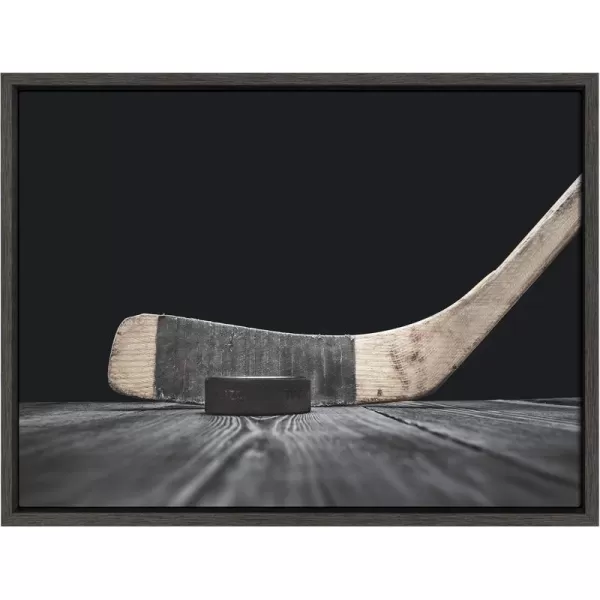 imageDesignOvation Sylvie Vintage Hockey Stick and Puck Framed Canvas Wall Art by Shawn St Peter 18x24 Dark Grey Traditional Sports Wall Decor for Office Bedroom Or Living Room