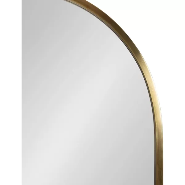 imageKate and Laurel Rowla Modern Arched Wall Mirror 24 x 32 Gold Decorative Glam Arch Mirror with Luxurious Polished Antique Brass Finish and Versatile StylingGold