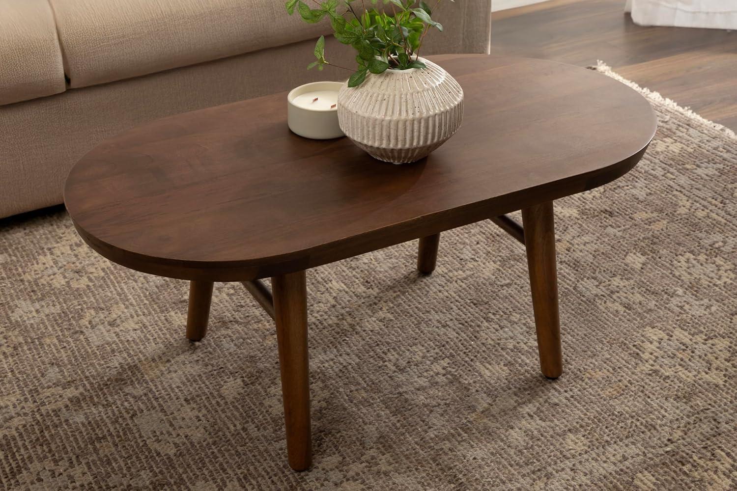 imageKate and Laurel Conan Oval Wooden MidCentury Coffee Table 38 x 20 x 17 Walnut Brown Rounded Living Room Table with Solid Mango Wood Construction and Tapered Dowel LegsWalnut Brown