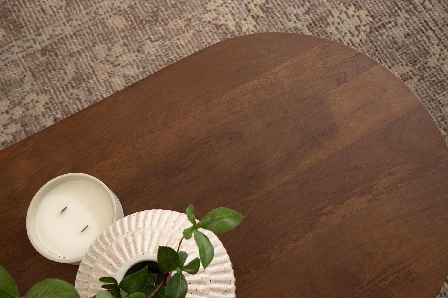 imageKate and Laurel Conan Oval Wooden MidCentury Coffee Table 38 x 20 x 17 Walnut Brown Rounded Living Room Table with Solid Mango Wood Construction and Tapered Dowel LegsWalnut Brown