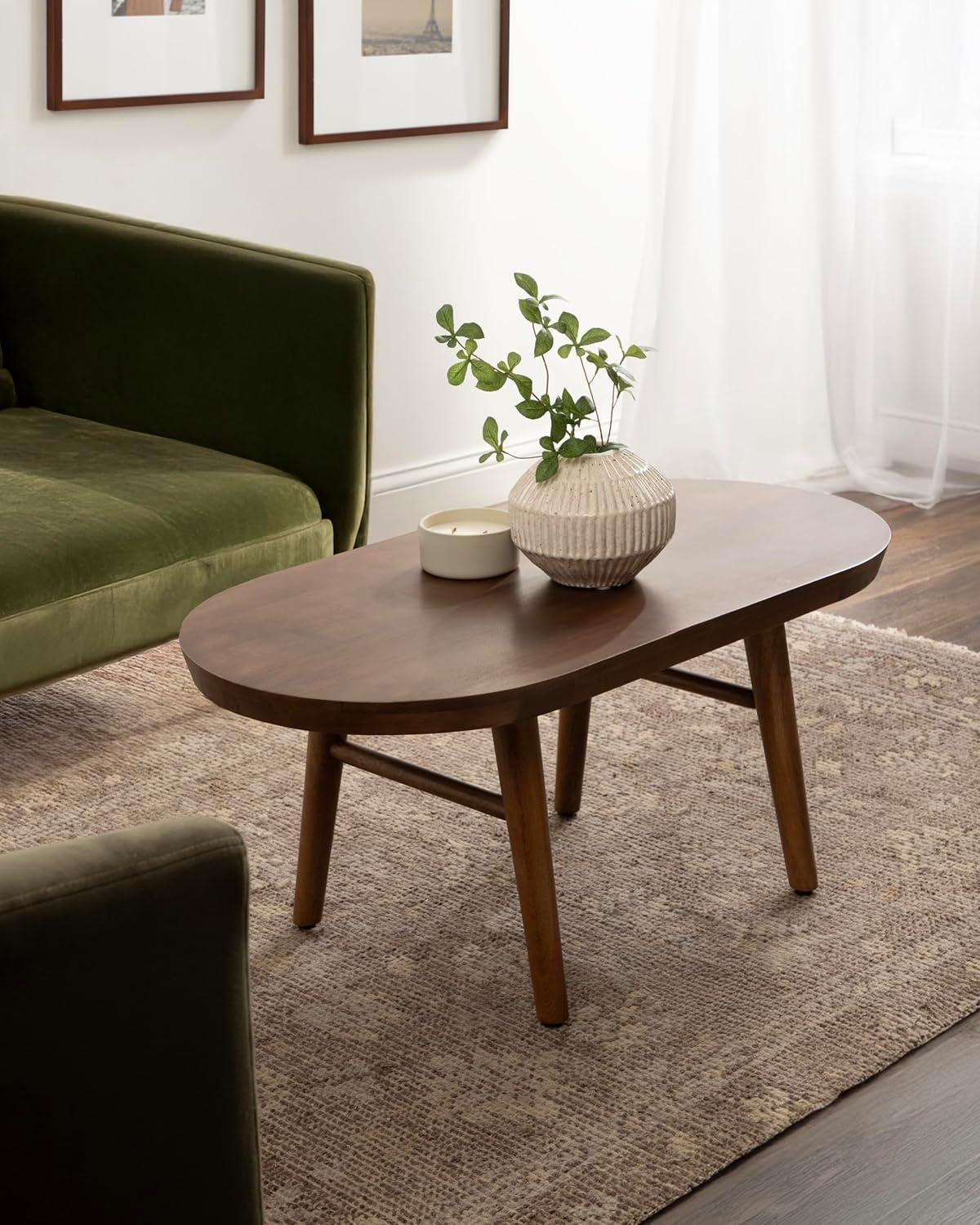 imageKate and Laurel Conan Oval Wooden MidCentury Coffee Table 38 x 20 x 17 Walnut Brown Rounded Living Room Table with Solid Mango Wood Construction and Tapered Dowel LegsWalnut Brown