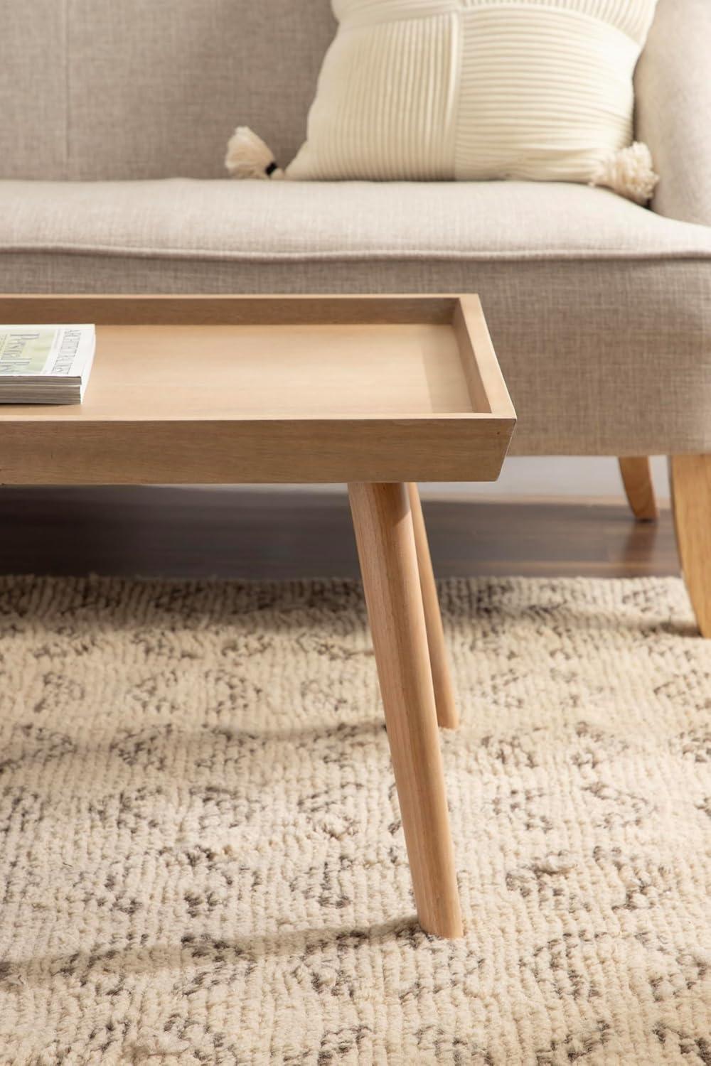 imageKate and Laurel Eastmont Rectangle Wood Coffee Table 46 x 22 x 17 Light Natural Large MidCentury Wooden Living Room Table with Stylish Tapered Legs and Adjustable FeetNatural