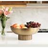 imageKate and Laurel Rooks Ribbed Decorative Metal Bowl 12 Inch Diameter Brass Modern Raised Fruit Bowl for Kitchen Counter or Use as a Key Bowl for an Entryway TableGold