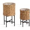 imageKate and Laurel Wikstrom Modern TwoPiece Planter Set with Liners 12 x 23 and 10 x 17 Natural Water Hyacinth Round Woven Planters for Use as Boho Plant Stands for Living Room or Bedroom Decor