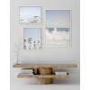 imageKate and Laurel Sylvie Waves Crashing Palm Tree Paradise and Pale Blue Lifeguard Tower Framed Canvas Wall Art Set by Caroline Mint Set of 3 two 16x20 and one 23x33 White Coastal Calming Wall Decor For Your Living Room or Bedroom