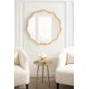 imageKate and Laurel Rahfy Boho Scalloped Round Rattan Mirror 32 Inch Diameter Natural Wood Decorative Round Wavy Mirror with Authentic Rattan Frame for Boho Wall DecorNatural