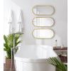 imageKate and Laurel Caskill Glam Wall Mirror Set Set of 3 10 x 22 Gold Decorative Modern Mirror Wall Decor Collection with Minimal Frame and Capsule Oval Shape