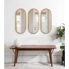 imageKate and Laurel Caskill Glam Wall Mirror Set Set of 3 10 x 22 Gold Decorative Modern Mirror Wall Decor Collection with Minimal Frame and Capsule Oval Shape