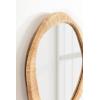 imageKate and Laurel Rahfy Boho Irregular Round Rattan Mirror 26 Inch Diameter Natural Rattan Decorative Wavy Circle Mirror with Wrapped Authentic Cane Frame for Bathroom Vanity Decor