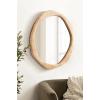 imageKate and Laurel Rahfy Boho Irregular Round Rattan Mirror 26 Inch Diameter Natural Rattan Decorative Wavy Circle Mirror with Wrapped Authentic Cane Frame for Bathroom Vanity Decor